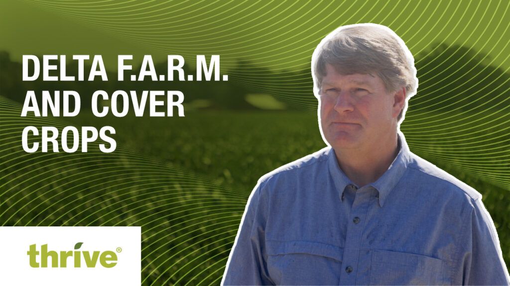 A photo of a Mississippi grower with the fields of cover crops at Delta F.A.R.M. in the background