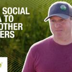 Brian Scott in front of a field of corn with text that reads 